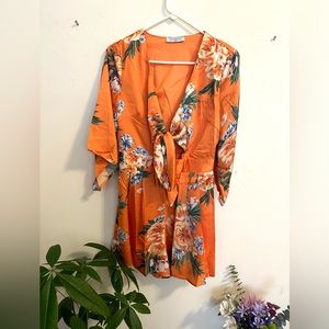 NWOT Closette chic Floral soft Fabric Romper in Size M